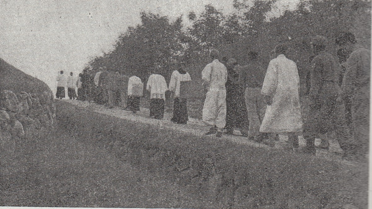 On October 11 1951 the remains of Father Tony Collier and Father Paddy Reilly are carried in procession to the bombed Cathedral in Chunchon, where Requiem Mass was celebrated.